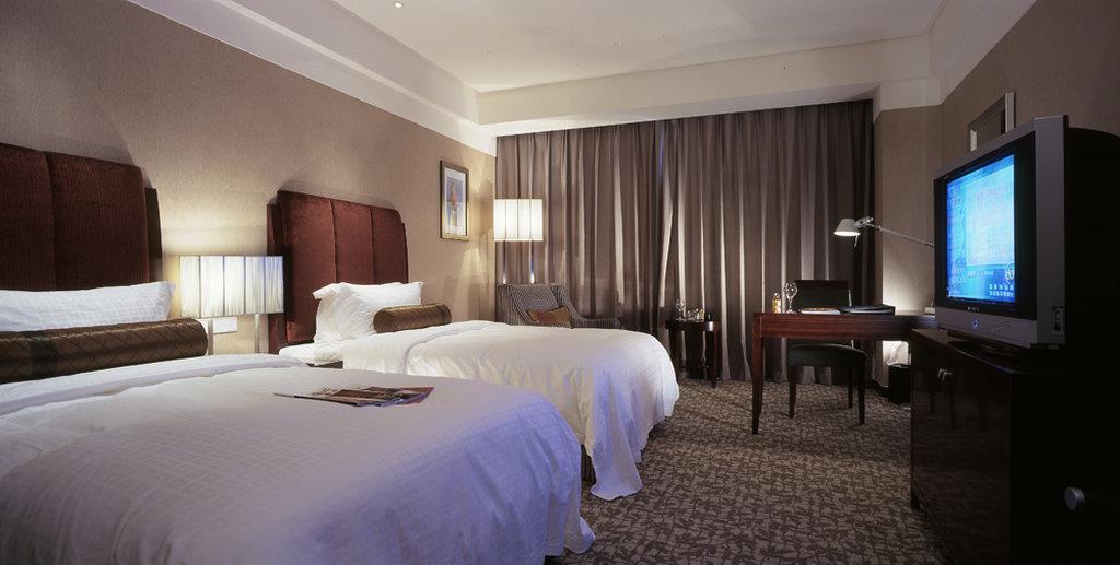 Ruiwan New Century Hotel Tianjin Room photo
